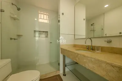a bathroom with a toilet and a sink and a shower at Edificio Morros 3, Beachfront & 2 Bedrooms by Inmobiliaria MFR in Cartagena de Indias