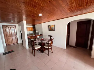 a kitchen and dining room with a table and chairs at Cartagena Mar 4You in Cartagena de Indias