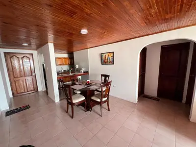 a kitchen and dining room with a table and chairs at Cartagena Mar 4You in Cartagena de Indias
