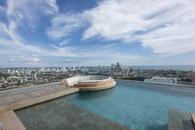 a swimming pool on the roof of a building at Cabrero Centro Tropical - Con vista al mar in Cartagena de Indias