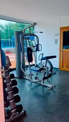 a gym with a cardio machine in a room at Mirador del Laguito 13003 in Cartagena de Indias