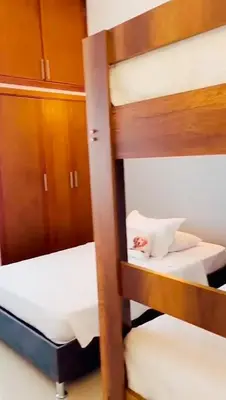 a couple of bunk beds in a room at Mirador del Laguito 13003 in Cartagena de Indias