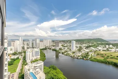 a view of a river in a city with buildings at Luxury Exlusive Panoramic View & Historic Center in Cartagena de Indias