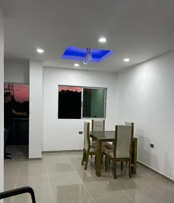a dining room with a table and chairs at Casa Cristal Apto x Dia! in Aracataca