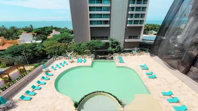 an overhead view of a swimming pool at a hotel at PLAYA BELLO HORIZONTE 