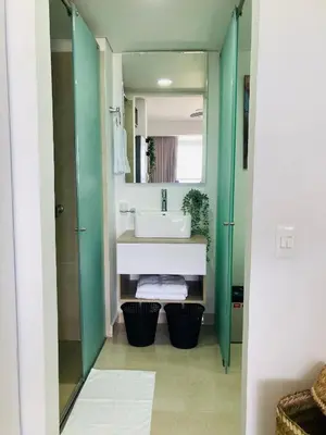 a bathroom with a sink and a mirror at Suite piso 12 con vista mágica Ciudad CB1241 in Cartagena de Indias