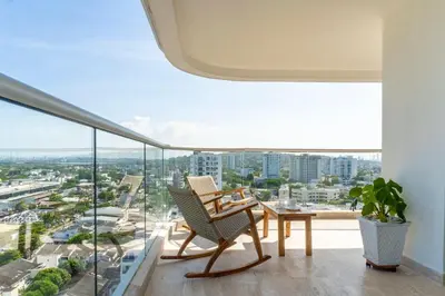 a balcony with a view of a city at CB1330 | Hermosa Suite Vista 180° 7min del Centro in Cartagena de Indias