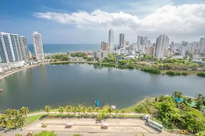 a large body of water in front of a city at 2C-AL2E APARTAMENTO DE 2 ALCOCABAS CERCA AL MAR CON AIRE ACONDICIONADO, PISCINA Y WIFi in Cartagena de Indias