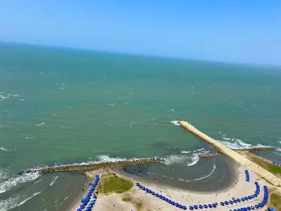 an aerial view of a beach and the ocean at Luxury Oceanfront Apartment in Cartagena Centro in Cartagena de Indias