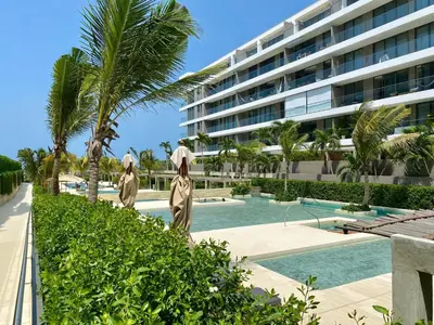 a resort with a swimming pool and a building at Morros EOS Manzanillo piso 3 in Cartagena de Indias