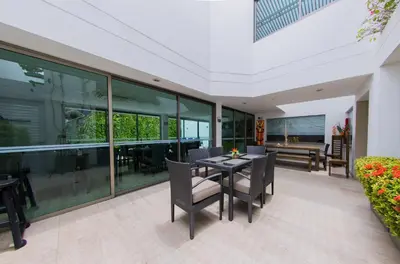 a dining room with a table and chairs at Varanasi Hotel Boutique Aeropuerto in Cartagena de Indias