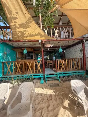 a group of chairs sitting in front of a building at Shekina Club House in Playa Blanca
