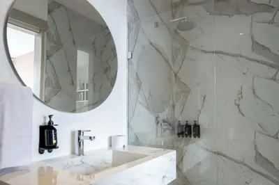 a bathroom with a sink and a mirror at San Martin by Wynwood House in Cartagena de Indias