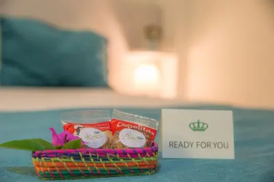 a basket of food with a sign that reads ready for you at Hotel Boutique La Artilleria in Cartagena de Indias