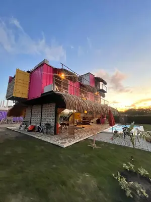 a large house with a roof with a yard at KITE en Mojarra Beach Habitación privada vista al mar in Salina de Rey