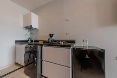 a kitchen with a sink and a dishwasher at Unbeatable Location -Exclusive Views- Clock Tower in Cartagena de Indias