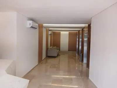 a hallway with a couch in a room at Unbeatable Location -Exclusive Views- Clock Tower in Cartagena de Indias