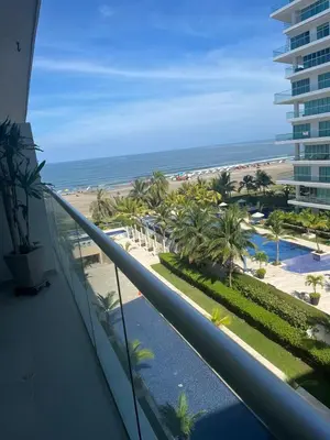 a view of the beach from the balcony of a resort at Hermoso apartamento MORROS EPIC in Cartagena de Indias