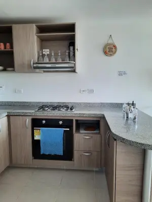 a kitchen with a stove and a counter top at Apartamento completo in Cartagena de Indias