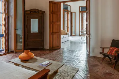 a living room with a vase on a coffee table at Casa Trujillo in Cartagena de Indias