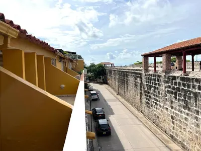 a view of a wall from the balcony of a building at Lovely Duplex with balcony! in Cartagena de Indias