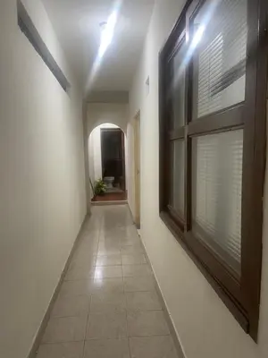 a hallway with a window and a tiled floor at Casa alojamiento entero - cerca al castillo san Felipe in Cartagena de Indias