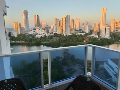 a view of a city from a balcony at Apartamento Moderno con Vista - Piso 12 in Cartagena de Indias