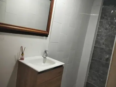 a bathroom with a sink and a shower at Hotel Boutique Tierra Del Mar Cartagena in Cartagena de Indias