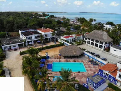 an aerial view of a resort with a swimming pool at Cabaña doña Santi in San Antero