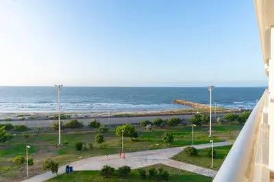 a view of the ocean from a building at Acogedora Suite Frente al Mar - Aeropuerto CB617 in Cartagena de Indias