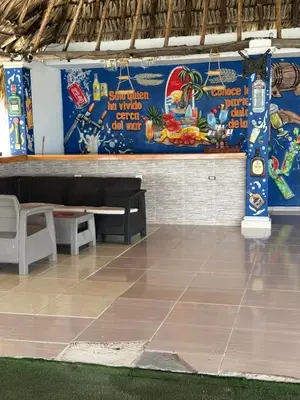 a room with a wall with a painting on it at Hotel Restaurante Arrecife in Isla de Tierra Bomba