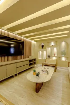 a living room with a large television and a table at Suites la iglesia in Cartagena de Indias