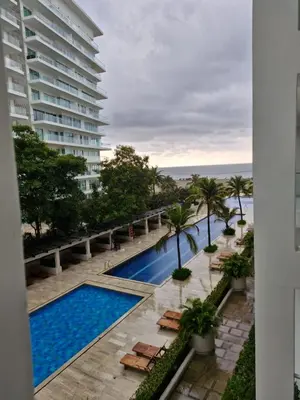 a view of the pool from the balcony of a building at Apartamento con vista al Mar Cartagena Morros 3 in Cartagena de Indias