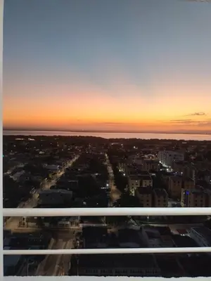 a sunset from the balcony of a building at Amaneceres de ensueño en Cartagena in Cartagena de Indias