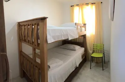 two bunk beds in a room with a window at El taller del artista I in Cartagena de Indias