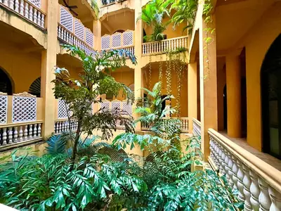 a building with plants on the side of it at by Calamari Homes - El Porvenir 401 walled city in Cartagena de Indias
