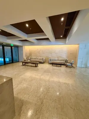 a lobby with couches and tables in a building at Murano centro 1 - 25 Floor byIMZ in Cartagena de Indias
