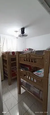 a room with two bunk beds in a room at Apartamento #3 in Puerto Colombia