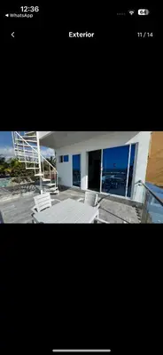 a picture of a building with a staircase in front of it at casa kite school in Cartagena de Indias
