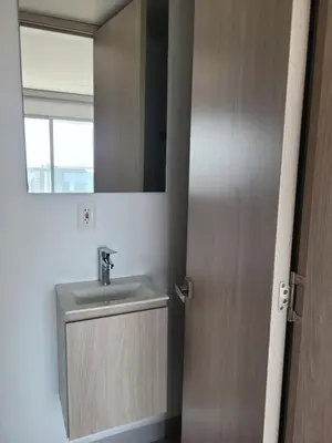 a bathroom with a sink and a mirror at Apartamento Magnoloft Bocagrande in Cartagena de Indias