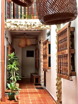 a hallway of a house with a balcony at Pachamama Hostel in Cartagena de Indias