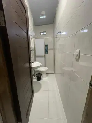 a bathroom with a toilet and a sink at Apartamento Salome Coveñas in Coveñas