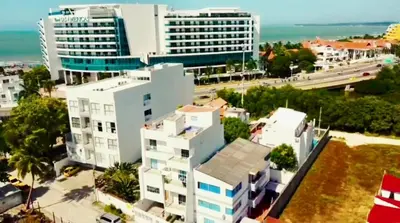 an aerial view of a building in a city at Apartamentos cerca al hotel Las Americas in Cartagena de Indias