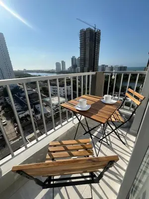 a table and chairs on a balcony with a view at Beautiful view in Cartagena in Cartagena de Indias