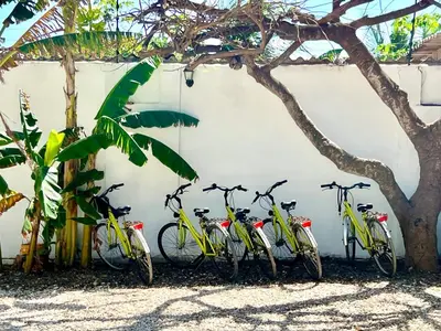 a group of bikes parked next to a wall at Hotel Villa Toti in Santa Veronica
