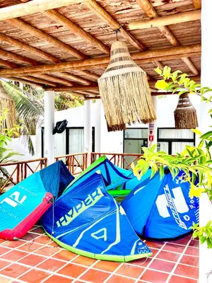 a group of umbrellas sitting on a patio at Hotel Villa Toti in Santa Veronica