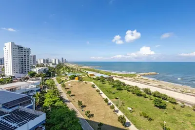 a view of the beach from a building at Cosy seaside studio with sunset view in Cartagena de Indias