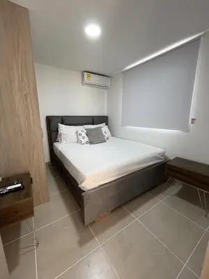 a bedroom with a bed in a room at Apartment with large balcony in Cartagena de Indias