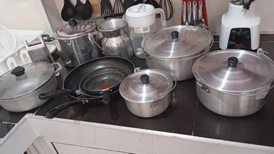 a group of pots and pans on a kitchen stove at Apartamento #7 in Puerto Colombia