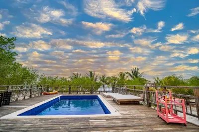 a swimming pool on the deck of a house at Casa del Mar by Al Alma in San Onofre